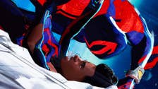 Miguel O'Hara has Miles Morales pinned down in Spider-Man: Across the Spider-Verse.